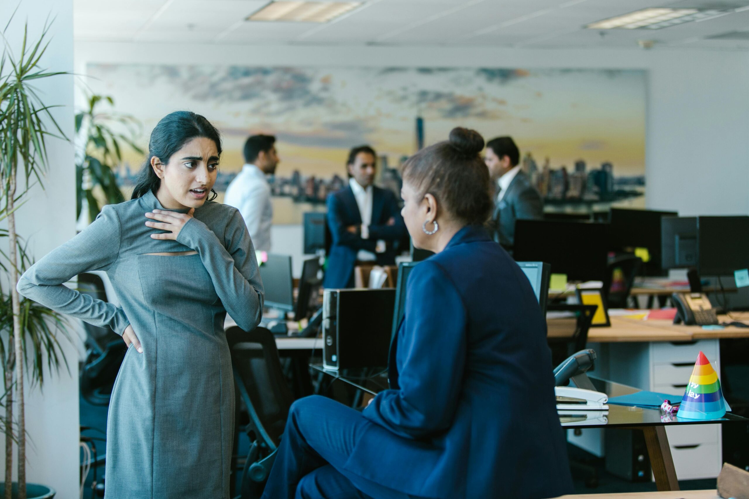 woman speaking to supervisor at work